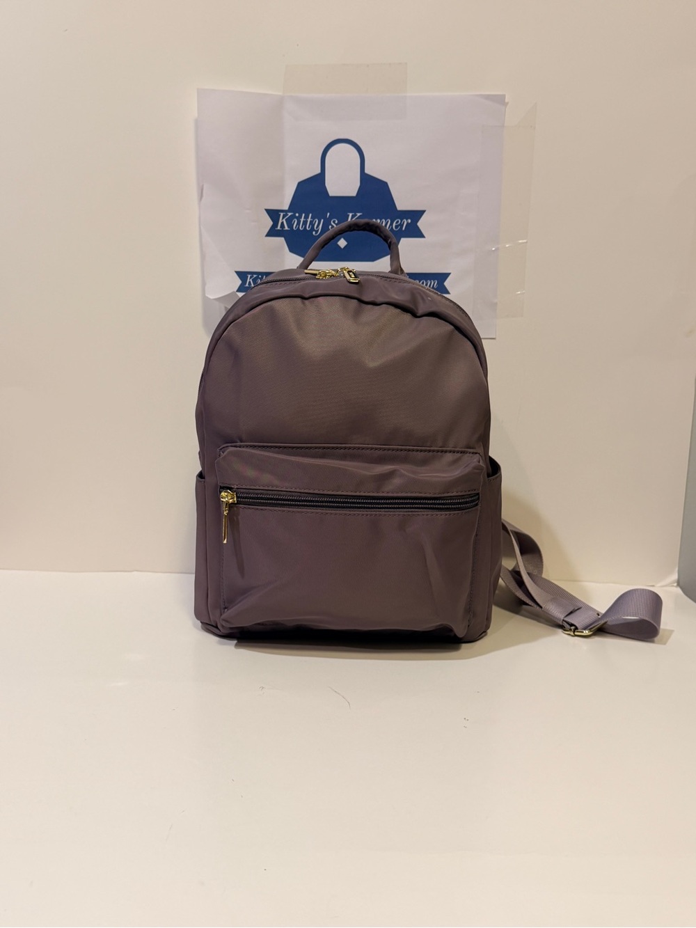 NWOT Grey Mini Backpack with Gold Accents